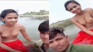 Topless Desi village girl enjoying outdoor bathing on selfie cam